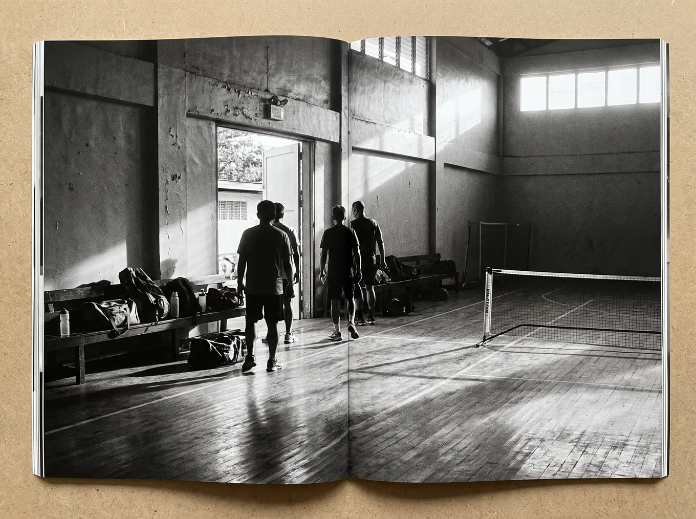 An indoor court set up for open play in a converted gym